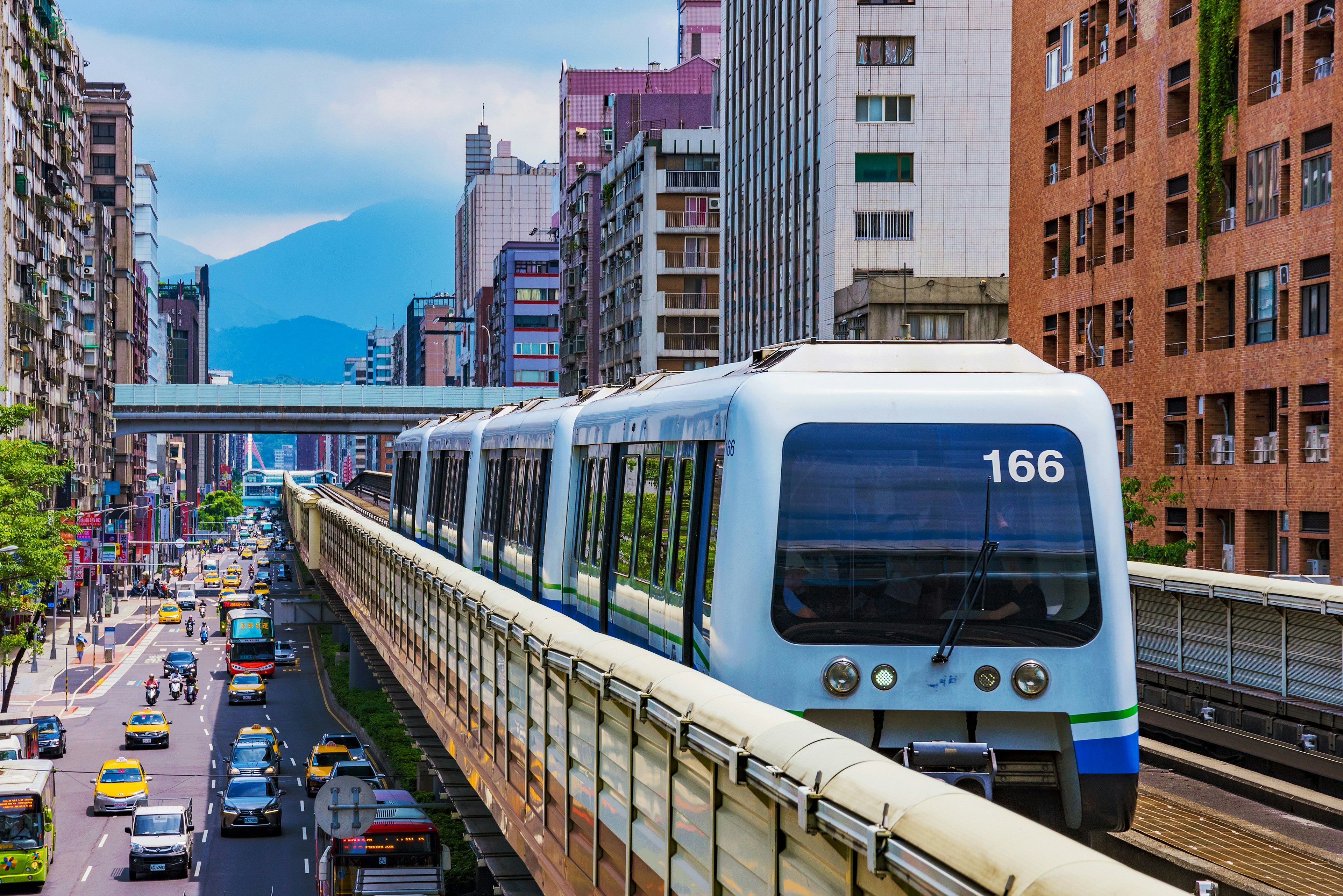 The MRT train above road traffic in Taipei