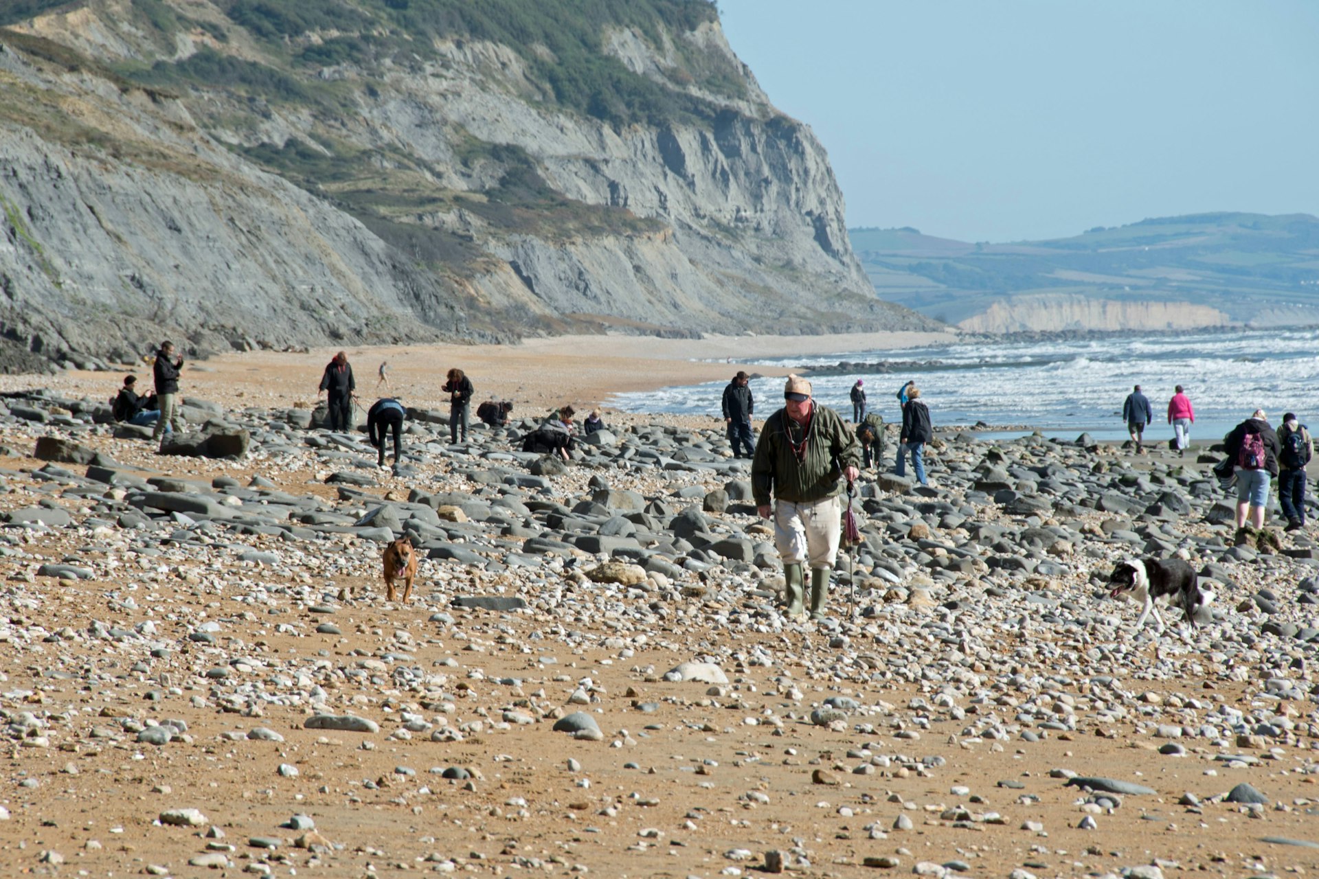 Fossil hunters at the world famous Jurassic coast between Charmouth and Golden Cap, Dorset.
