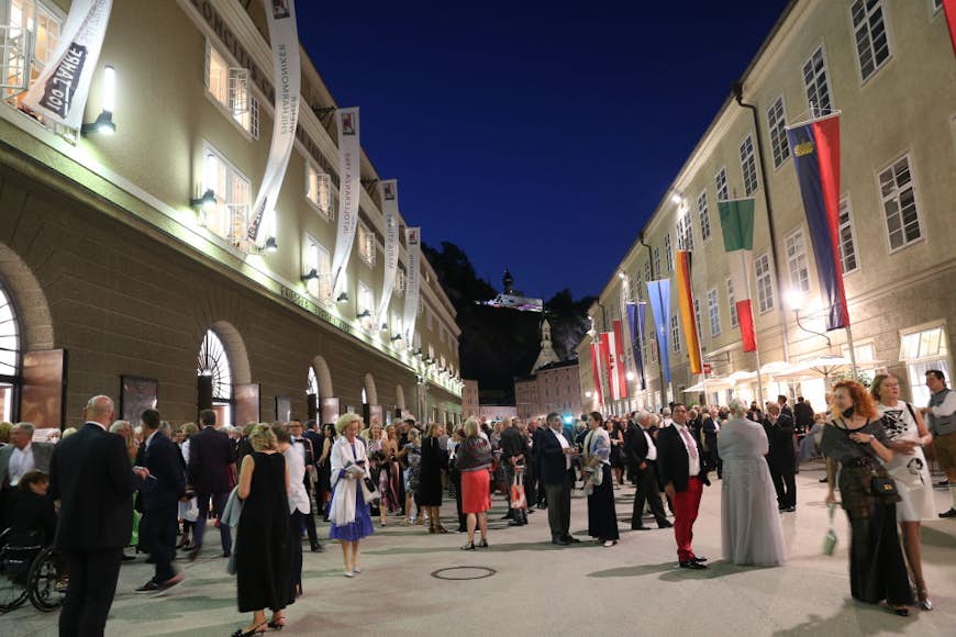People in the street at an opera premiere at the Salzburg Festival, Salzburg, Salzburgerland, Austria, Europe