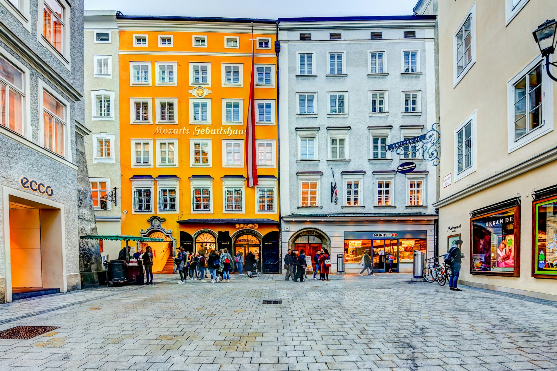 Yellow exterior facade of the birthplace of Mozart in Salzburg