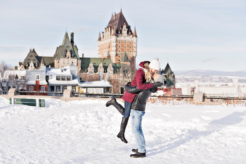 Young couple outside in winter with Quebec city Chateau frontenac; Shutterstock ID 1008126691; your: Brian Healy; gl: 65050; netsuite: Lonely Planet Online Editorial; full: Things to know before Quebec City