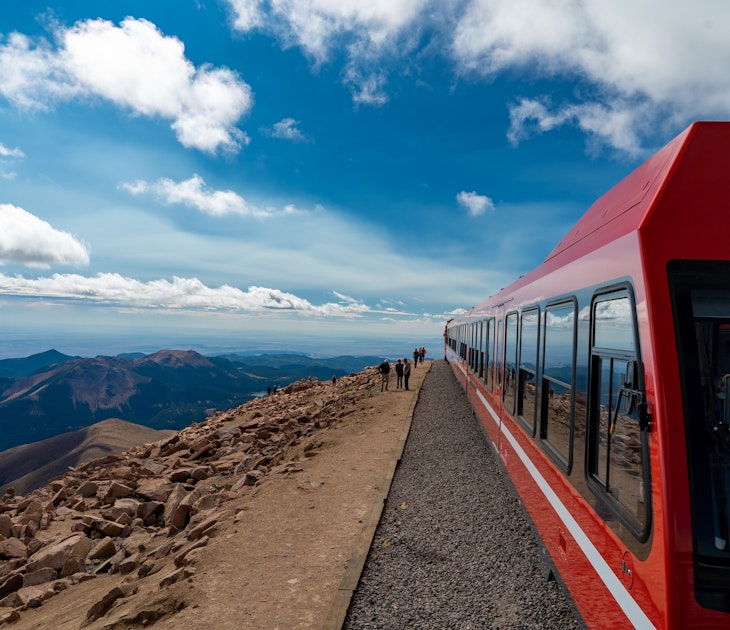 Colorado Springs - 9-19-2021: A view of a pikes peak cog railway train waiting to load passengers for their return trip to the lower station; Shutterstock ID 2053339679; your: Brian Healy; gl: 65050; netsuite: Lonely Planet Online Editorial; full: Best things to do in Colorado Springs