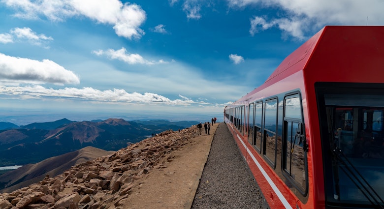 Colorado Springs - 9-19-2021: A view of a pikes peak cog railway train waiting to load passengers for their return trip to the lower station; Shutterstock ID 2053339679; your: Brian Healy; gl: 65050; netsuite: Lonely Planet Online Editorial; full: Best things to do in Colorado Springs