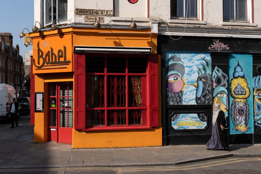 Street art outside the Babel restaurant on Brick Lane on 24th March 2022 in East London, United Kingdom.