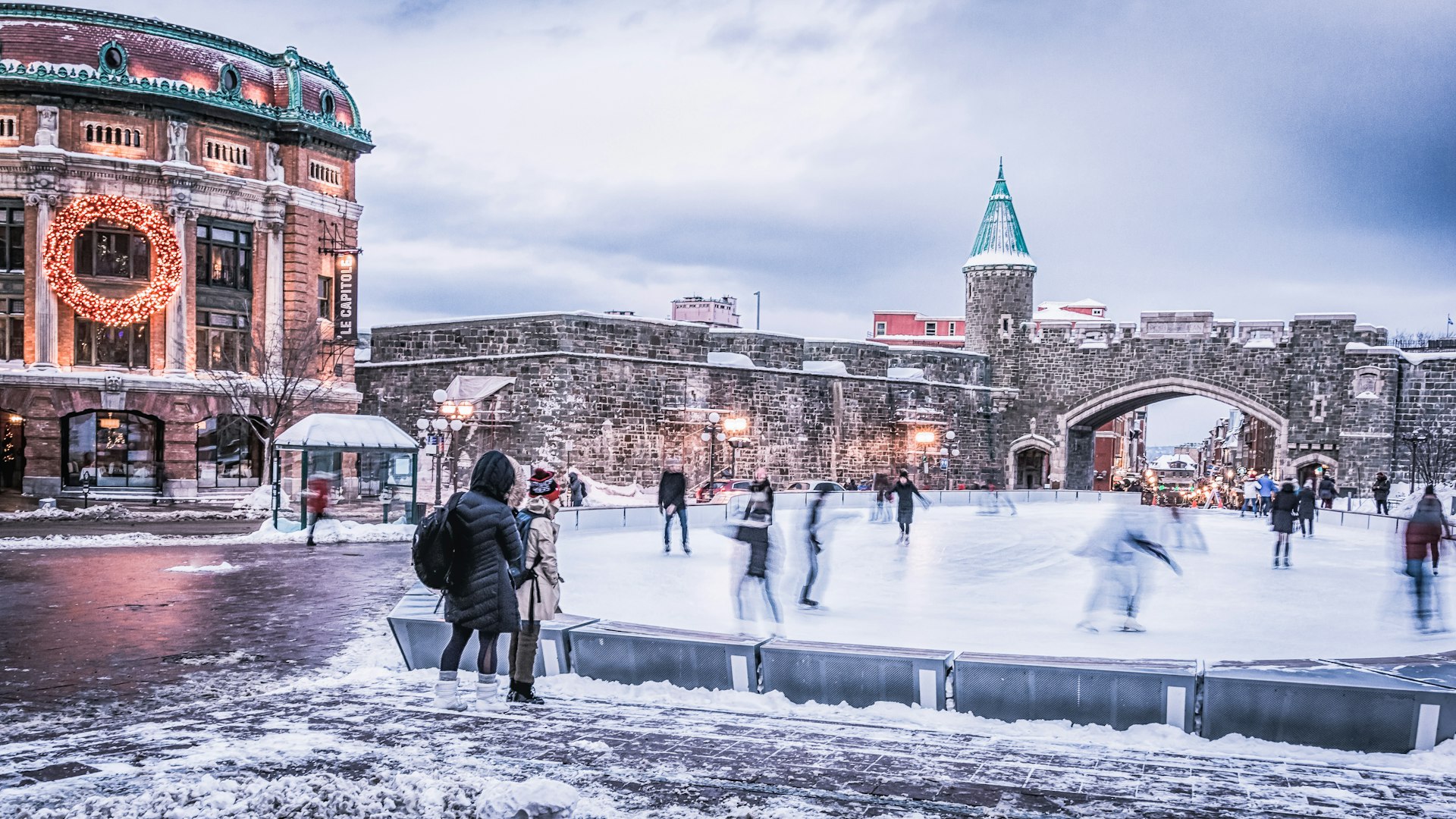 Ice skating in Place D'Youville during winter 