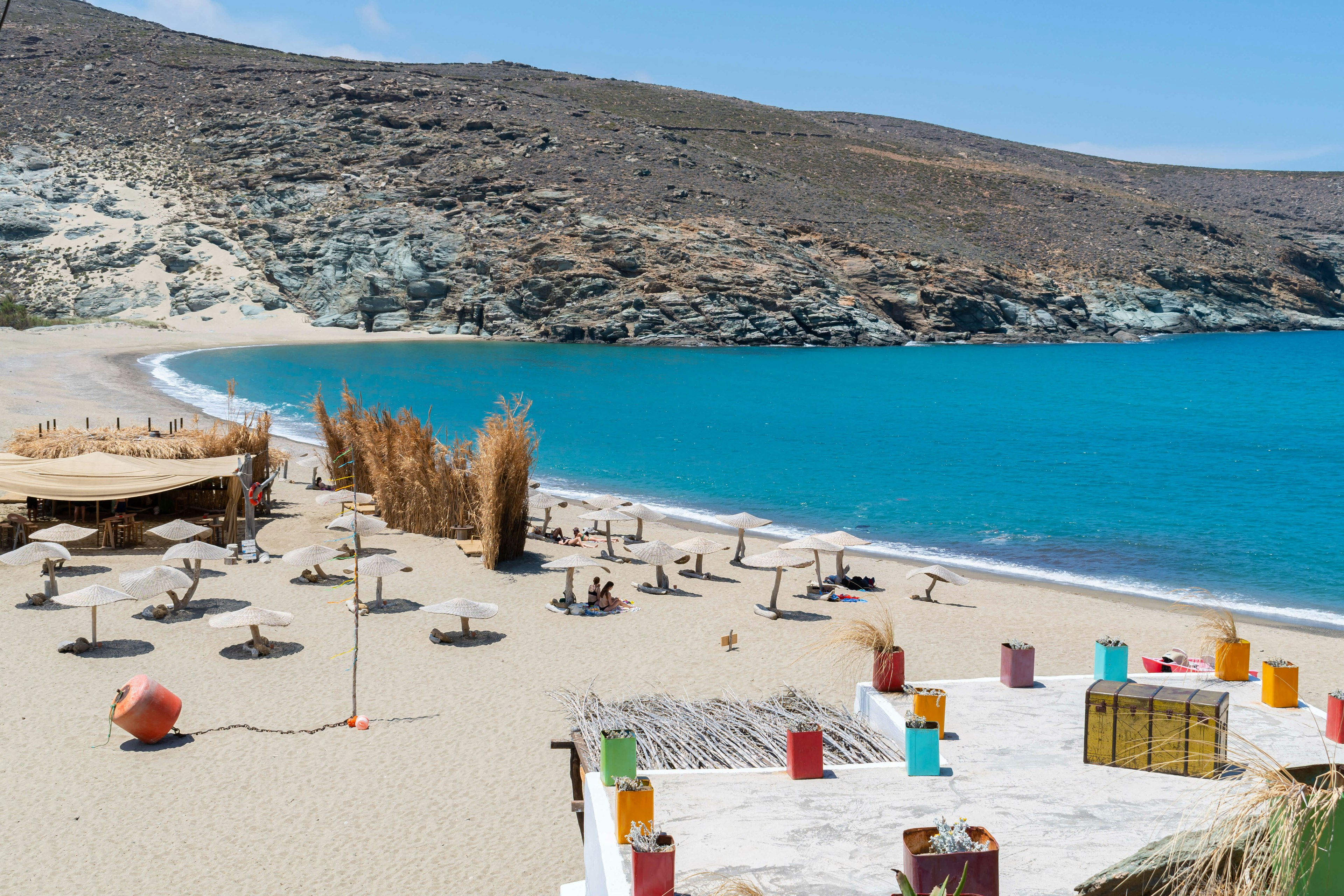 Umbrellas on Kolympithra beach in Tinos island, Greece