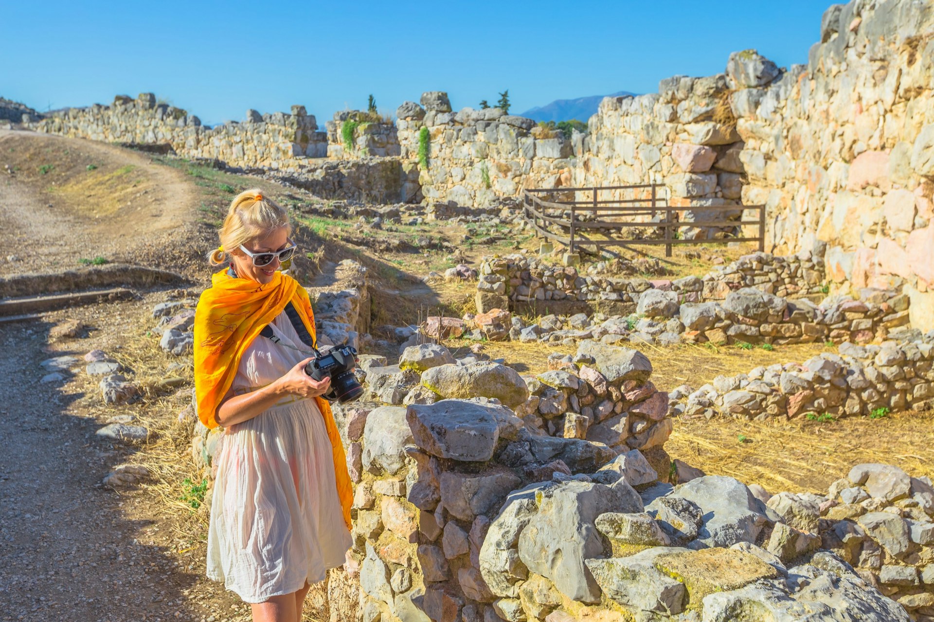 Traveler,Woman,Photographer,At,Of,Archaeological,Site,Of,Ancient,Mycenae,