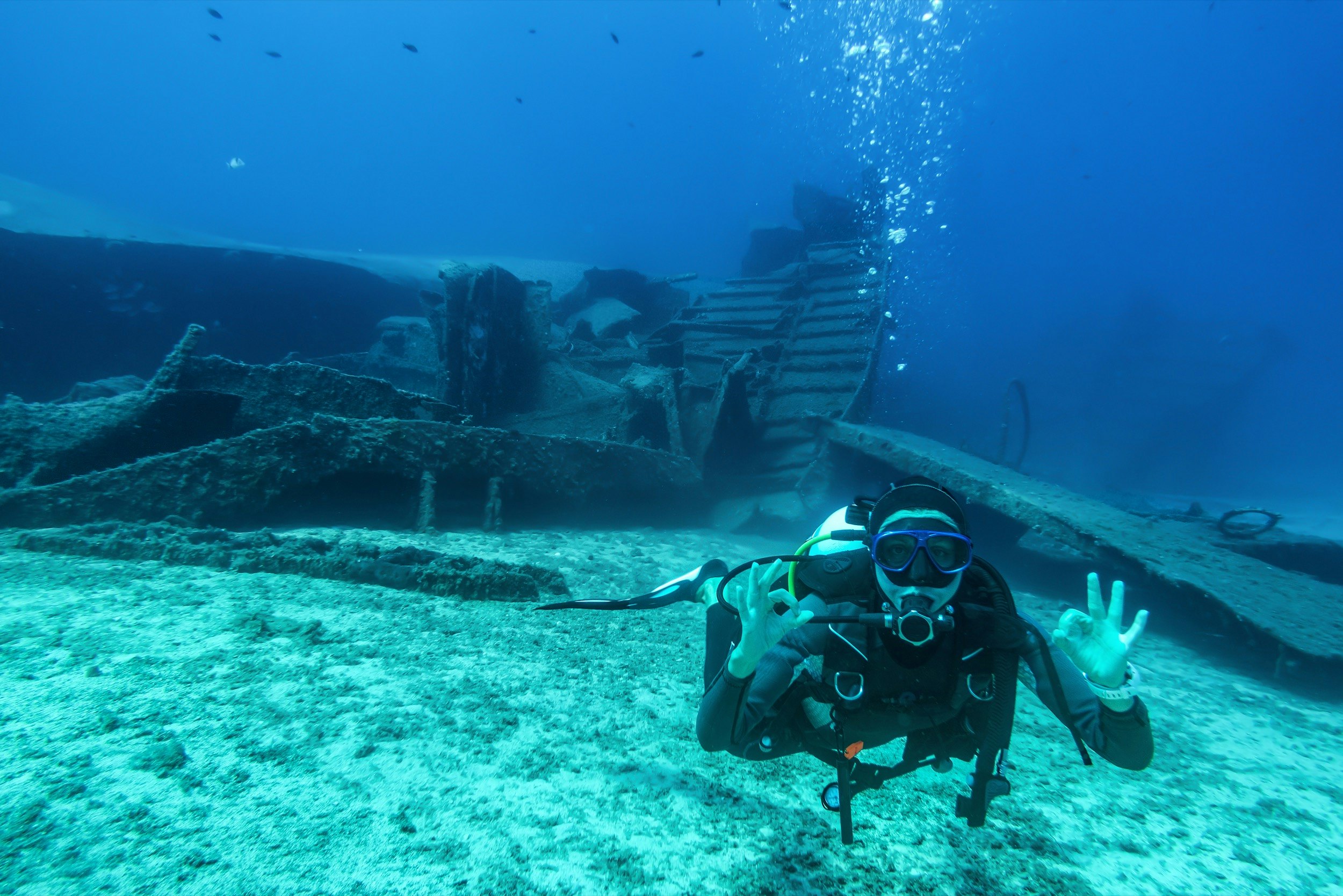 Scuba,Diver,Shows,The,Ok,Sign,Under,Water,During,A