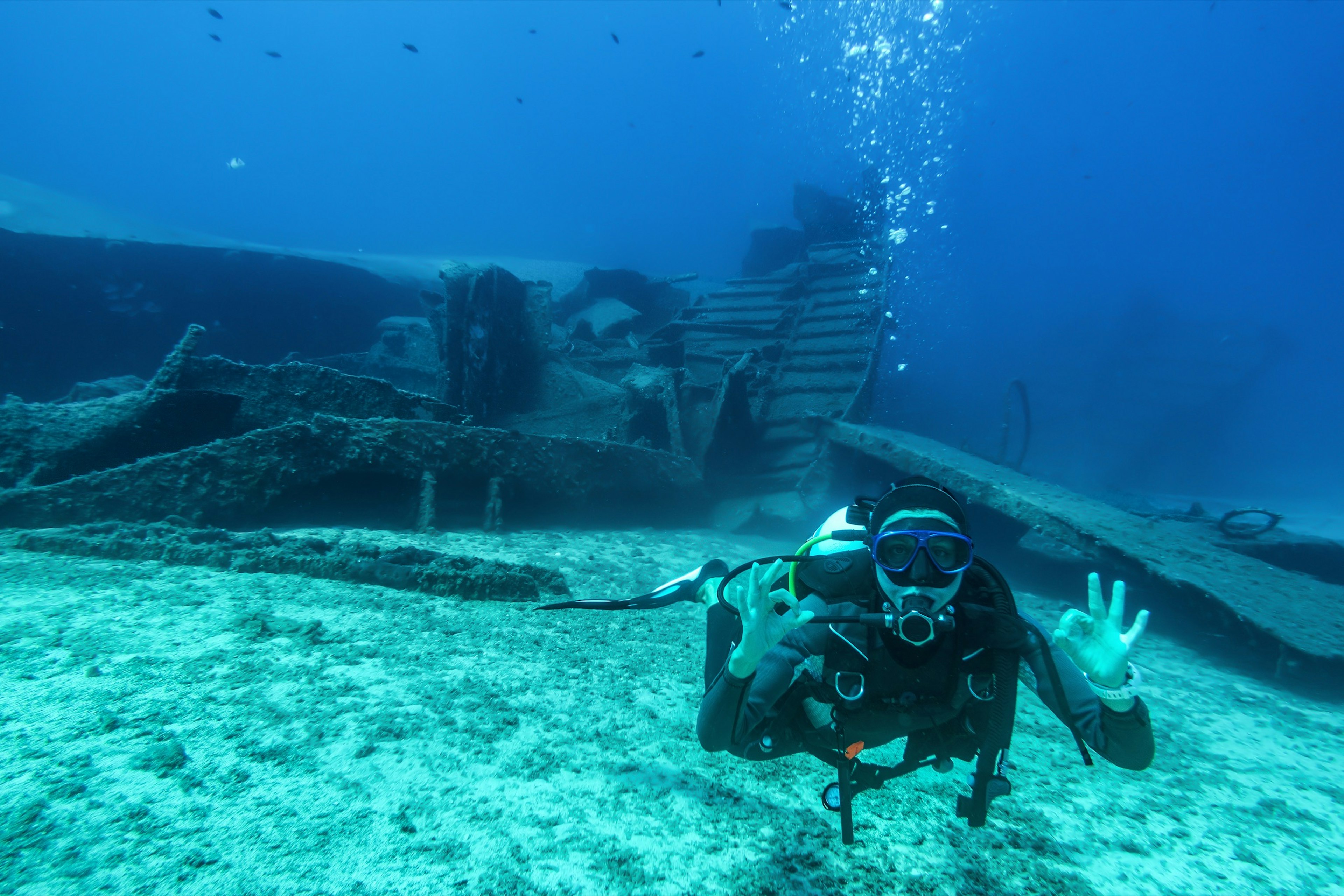 Scuba,Diver,Shows,The,Ok,Sign,Under,Water,During,A