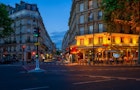 Cozy street with tables of cafe in Paris, France. Night cityscape of Paris. Architecture and landmarks of Paris.; Shutterstock ID 2043692471; your: Ben N Buckner; gl: 65050; netsuite: Online Editorial; full: Samsung Night Cities