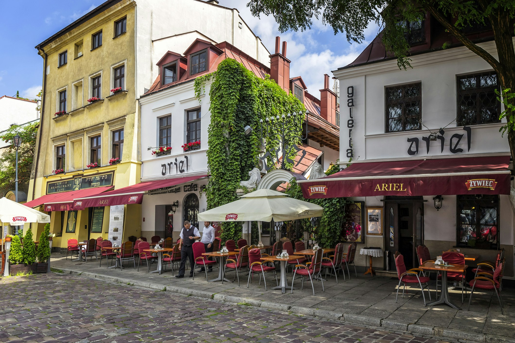 Jewish restaurant and cafe pub on a cobbled street in the Kazimierz district in Krakow, Poland