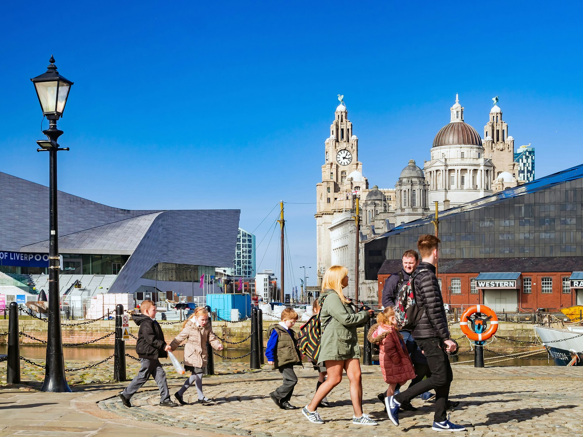 A view of the Albert Dock and Pier Head area at the Port of Liverpool and Royal Liver building part of the well known "The three Graces".