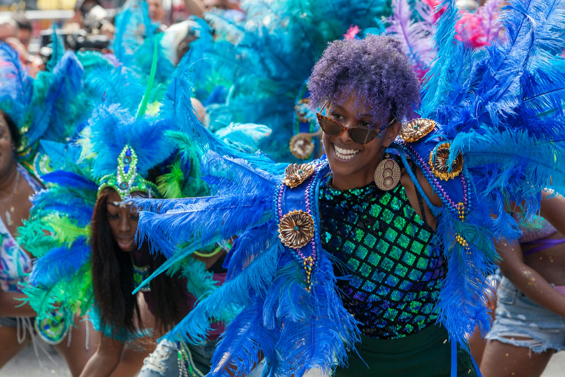 Dancers in colorful costumes for the Notting Hill Carnival