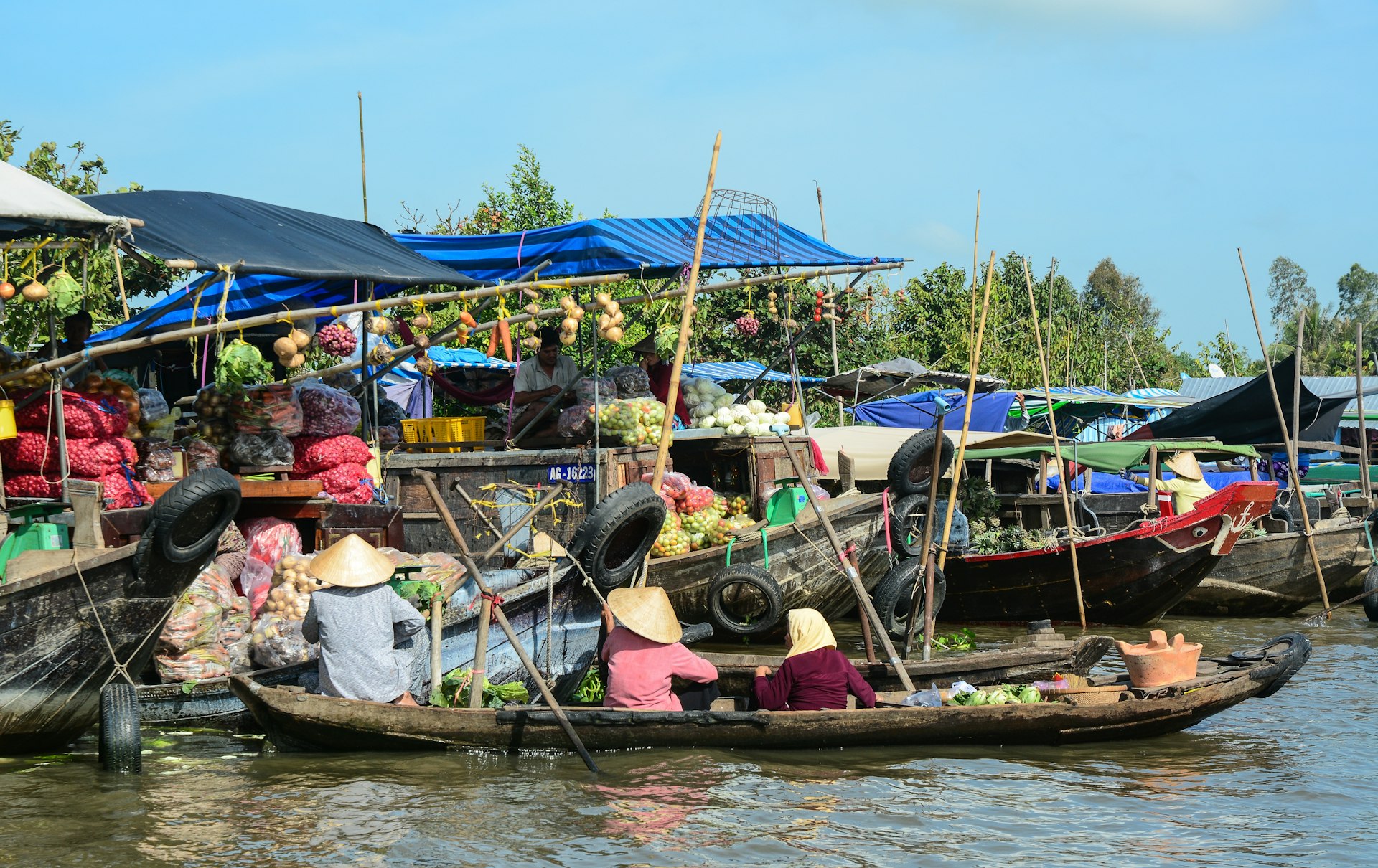 Traders at the floating market in Can Tho