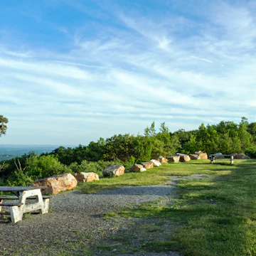 Sunset view of three states from monument at High Point State Park in New Jersey.
