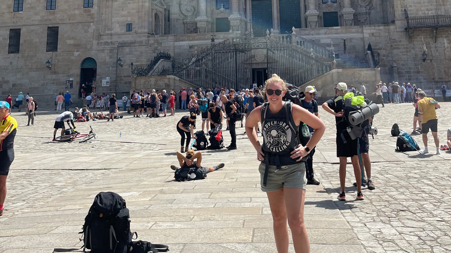 ÌÇÐÄ´«Ã½ senior news editor Melissa Yeager at the Cathedral in Santiago de Compostela after finishing the Portuguese Way of the pilgrimage.