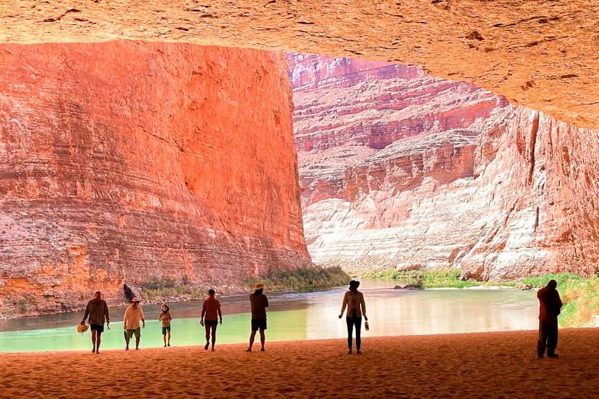 Rafters explore a huge cave on the banks of the Colorado River