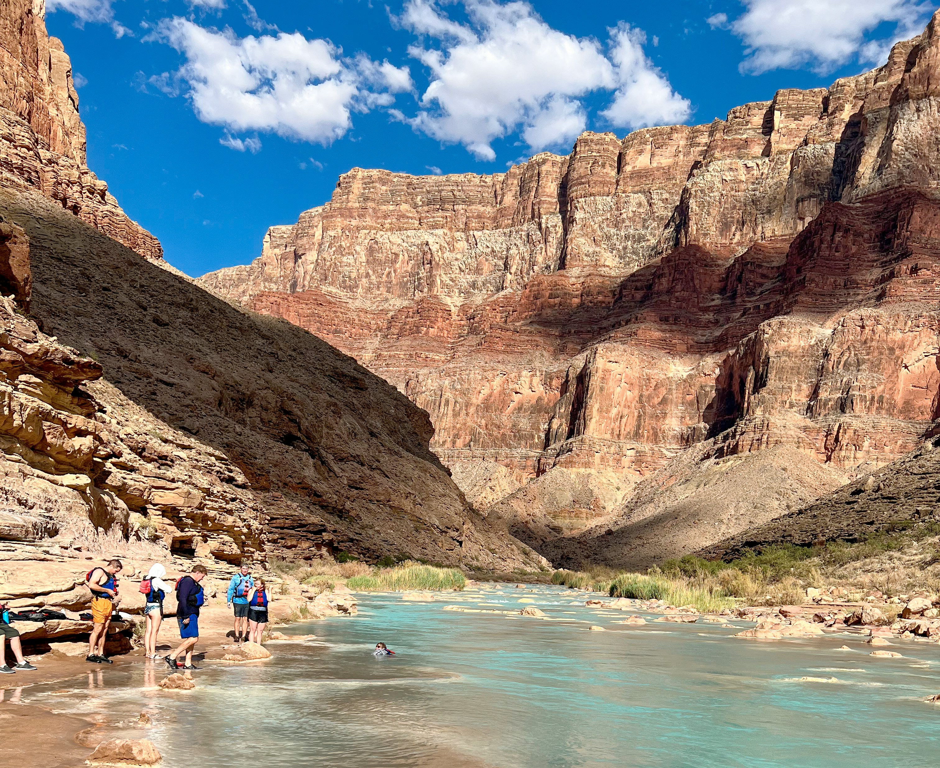 Rafters pause on the banks of the Colorado River