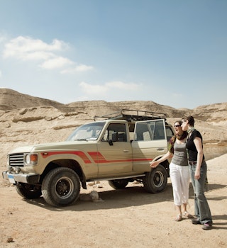 Women on a road trip in the desert in Egypt