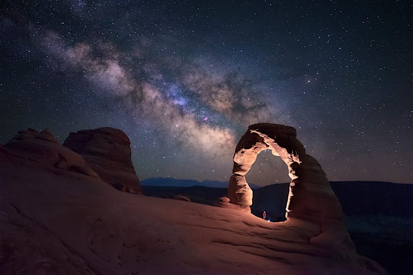 Standing under the Delicate Arch watching the Milky Way, Arches National Park, Moab, Arizona