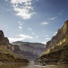 White water rafters float down the Colorado River near Blacktail Canyon.