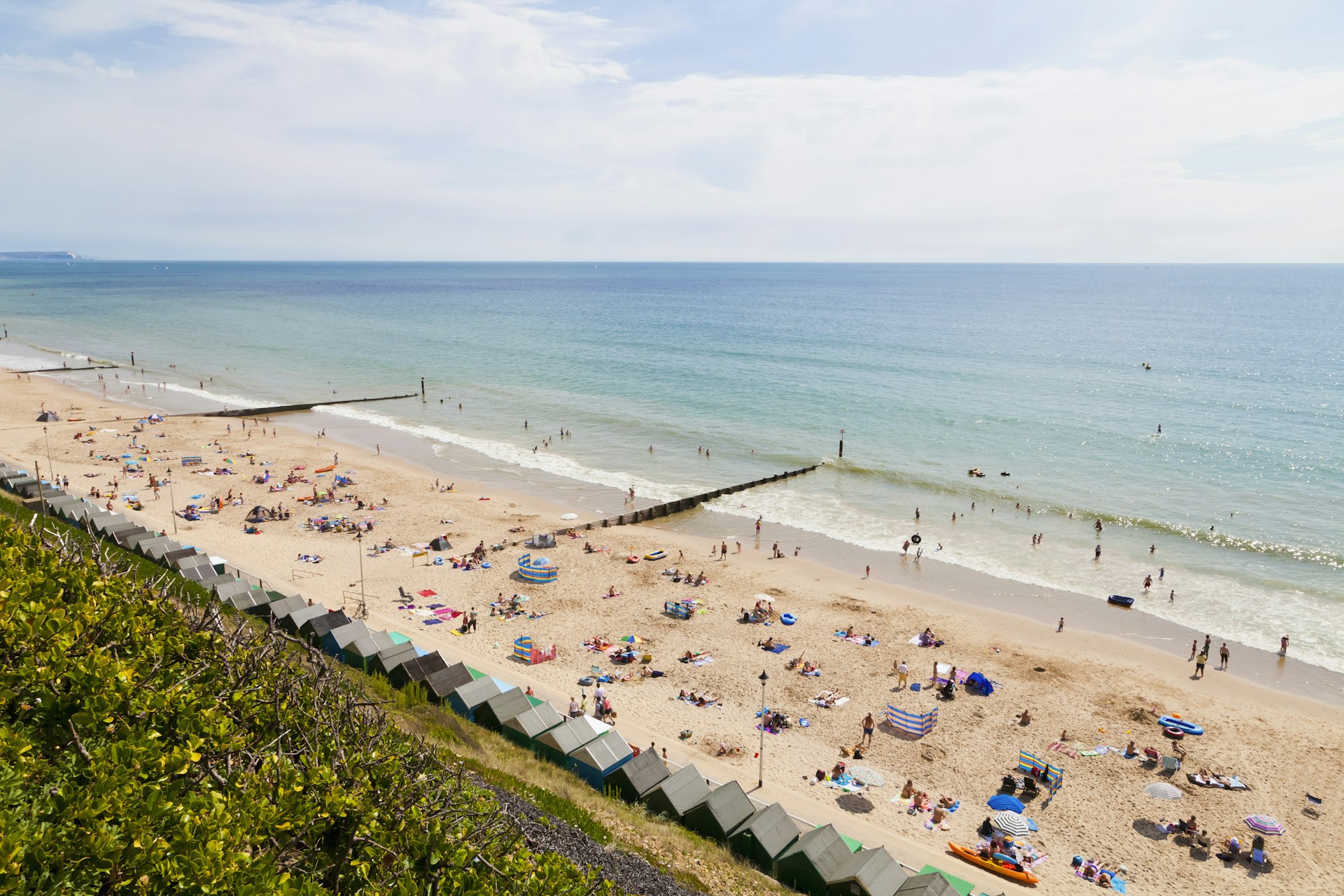 A high-angle view of beachgoers on a sunny day