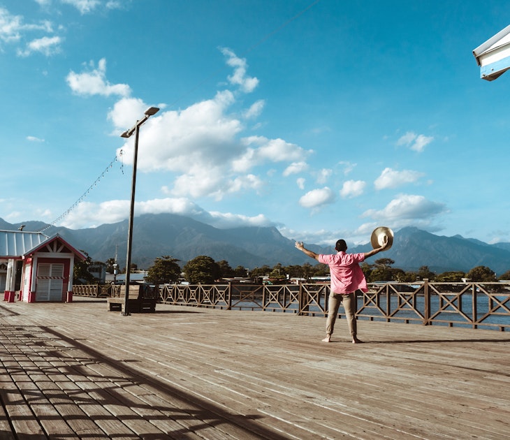 Tourist in a hat in the port of the city of La Ceiba, Honduras