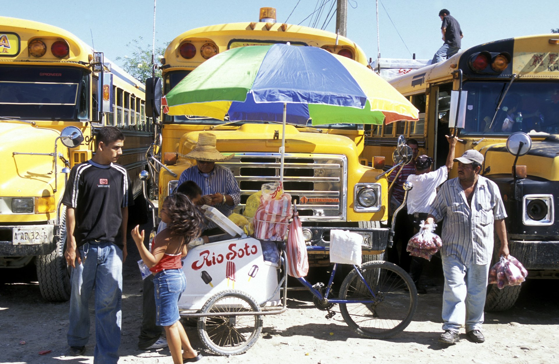 Local buses in the bus terminal in Tela near San Pedro Sula, Honduras