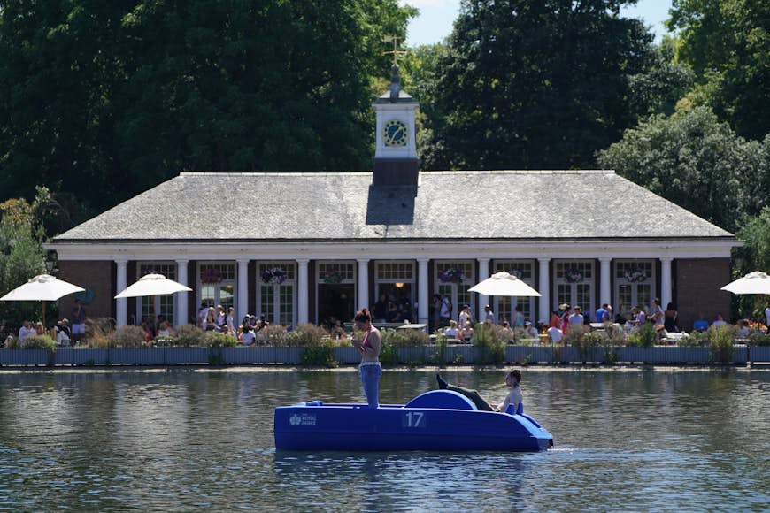 People in pedalos on the Serpentine, Hyde Park, London