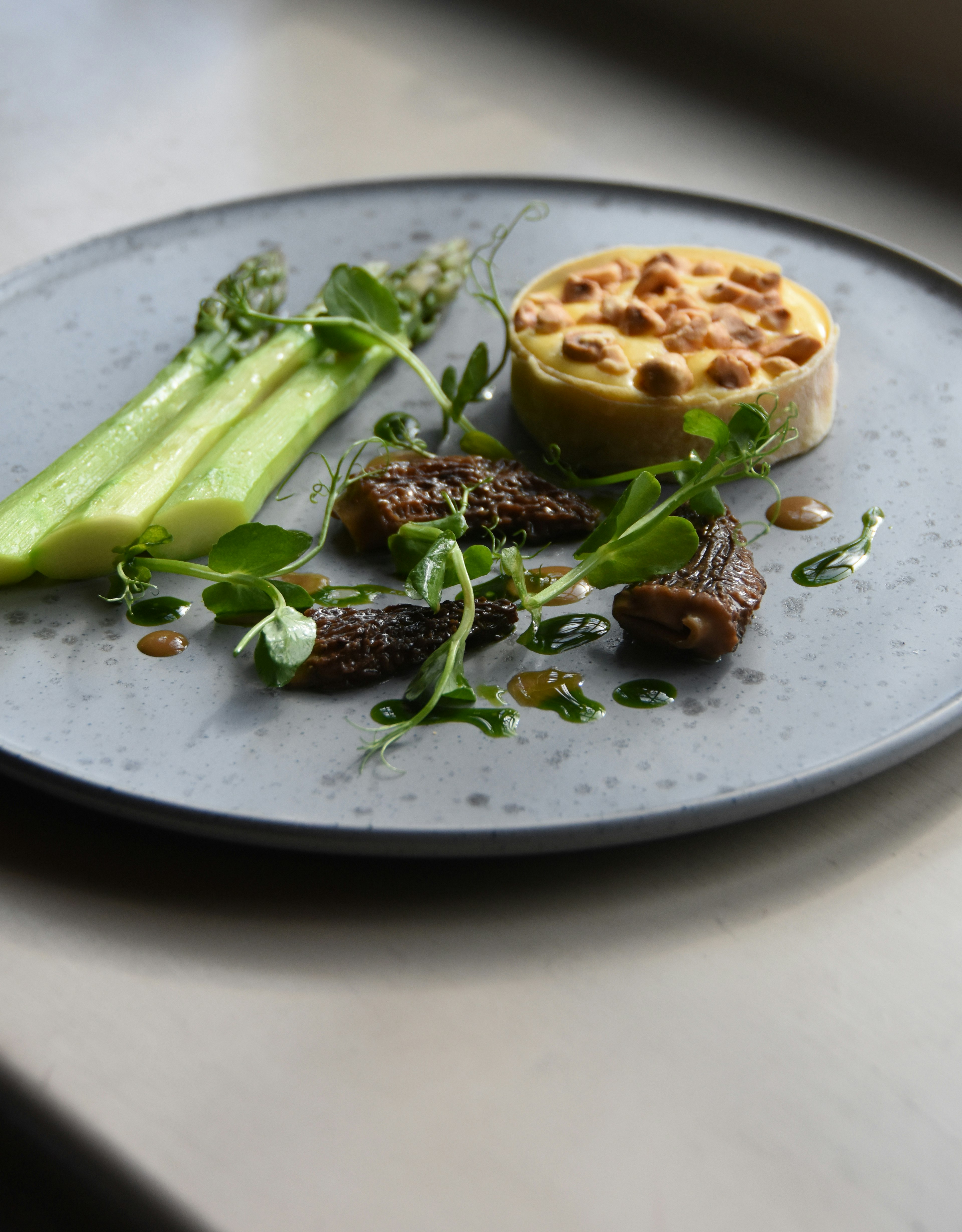 Salad of asparagus, morels, lemon sabayon, toasted hazelnut