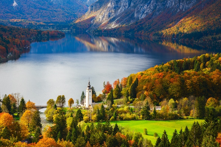 Aerial view of Bohinj lake in Julian Alps.  Popular touristic destination in Slovenia.; Shutterstock ID 560473885; your: Ben N Buckner; gl: 65050; netsuite: Online Editorial; full: Lake Bohinj Slovenia