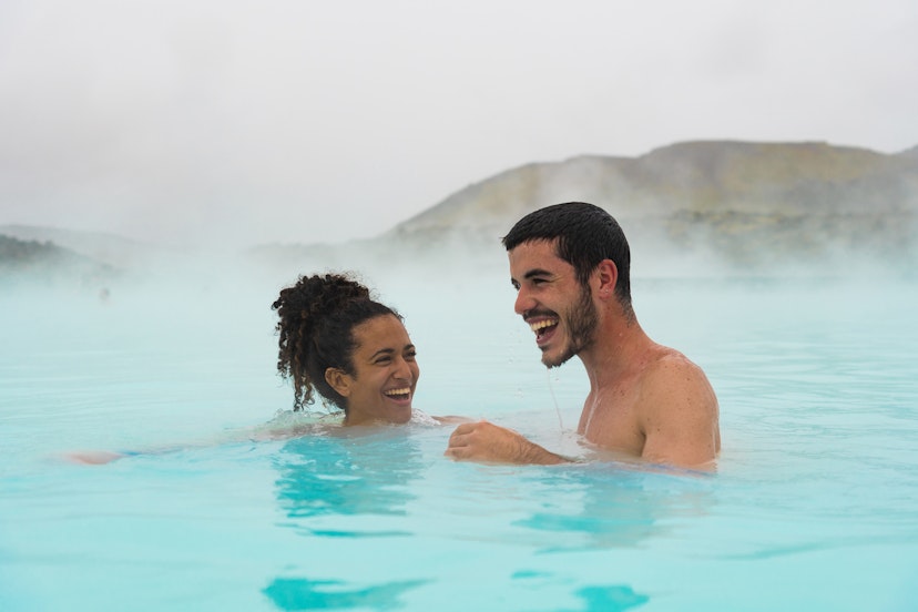 Couple swimming in Blue Lagoon, Iceland