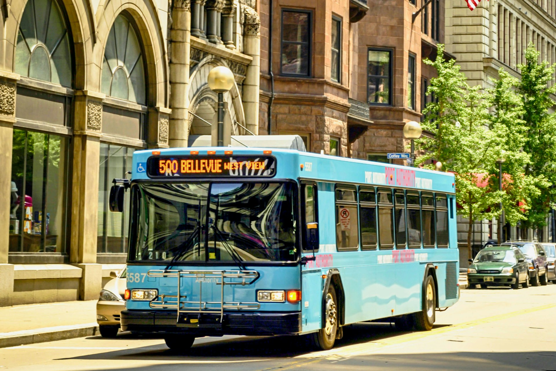 A blue public transport bus in downtown Pittsburgh, Pennsylvania USA