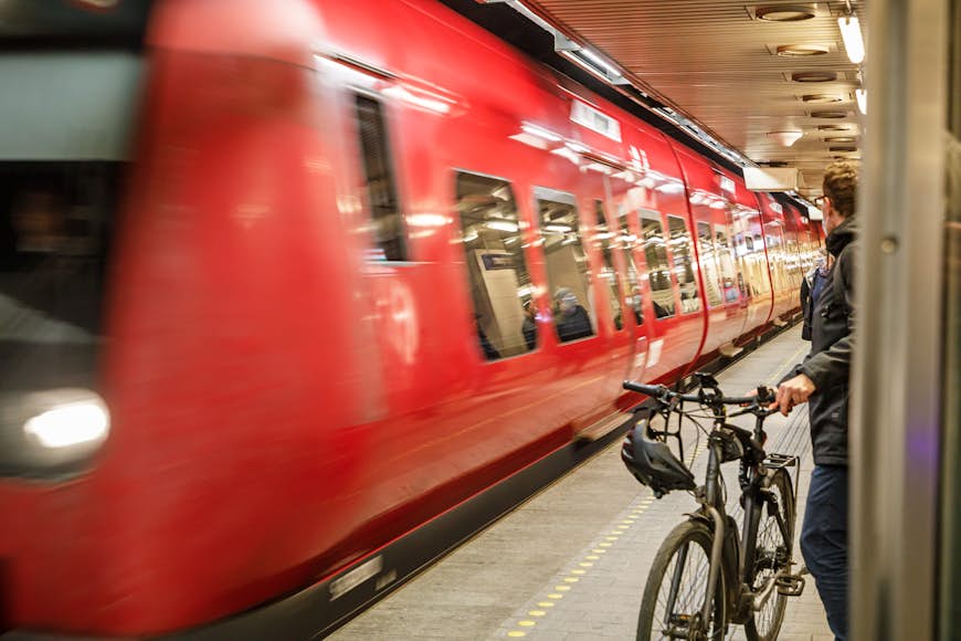 Red Copenhagen Metro train arrives at Nørreport station
