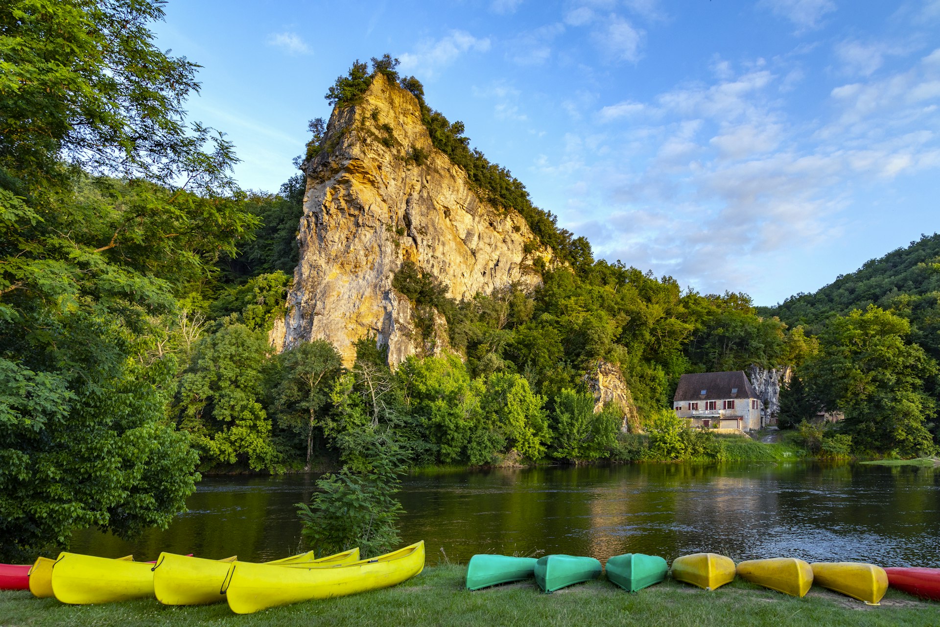 Late afternoon sunshine on the Dordogne River in the Nouvelle-Aquitaine region, France