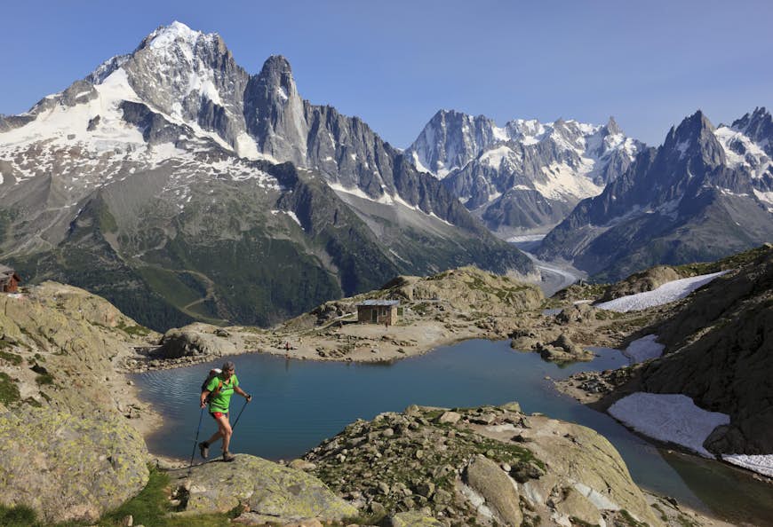 A hiker crosses rocky terrain near Lac Blanc, Chamonix, France