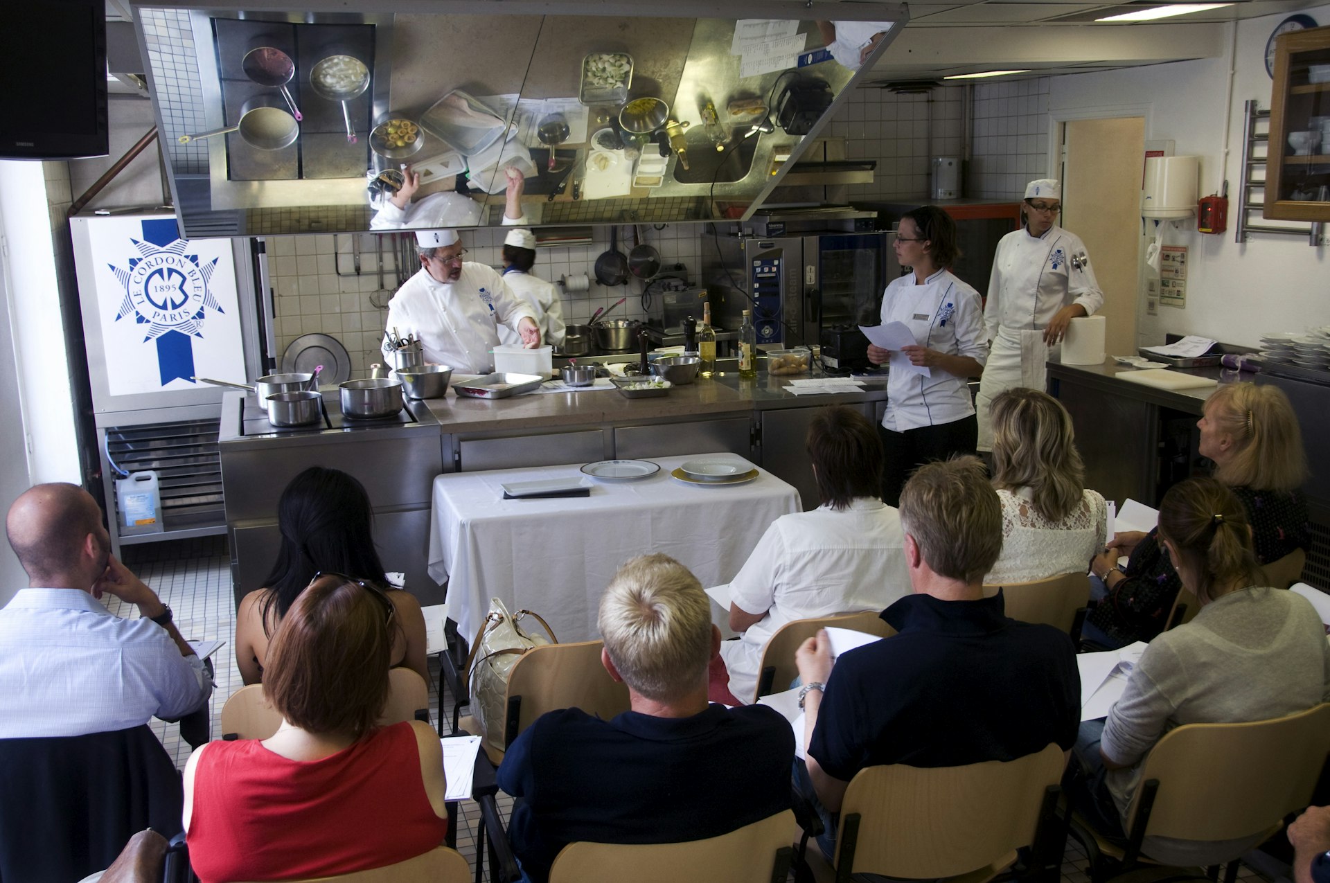 Students taking a cooking course at Ecole Le Cordon Bleu, Paris
