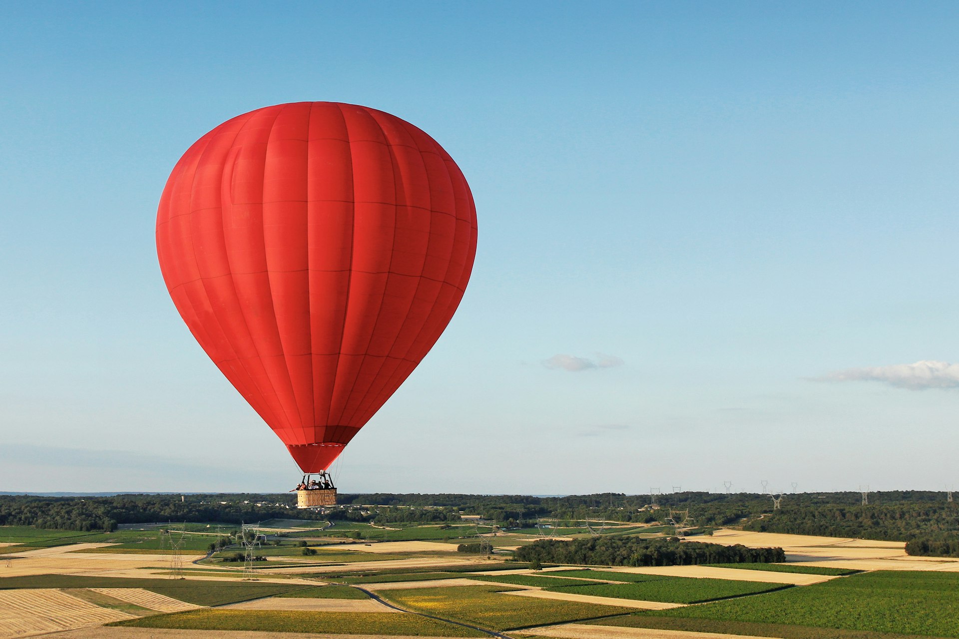 Hot air balloon seen from the sky in the Saumur region, in the Loire Valley, Maine-et-Loire, France
