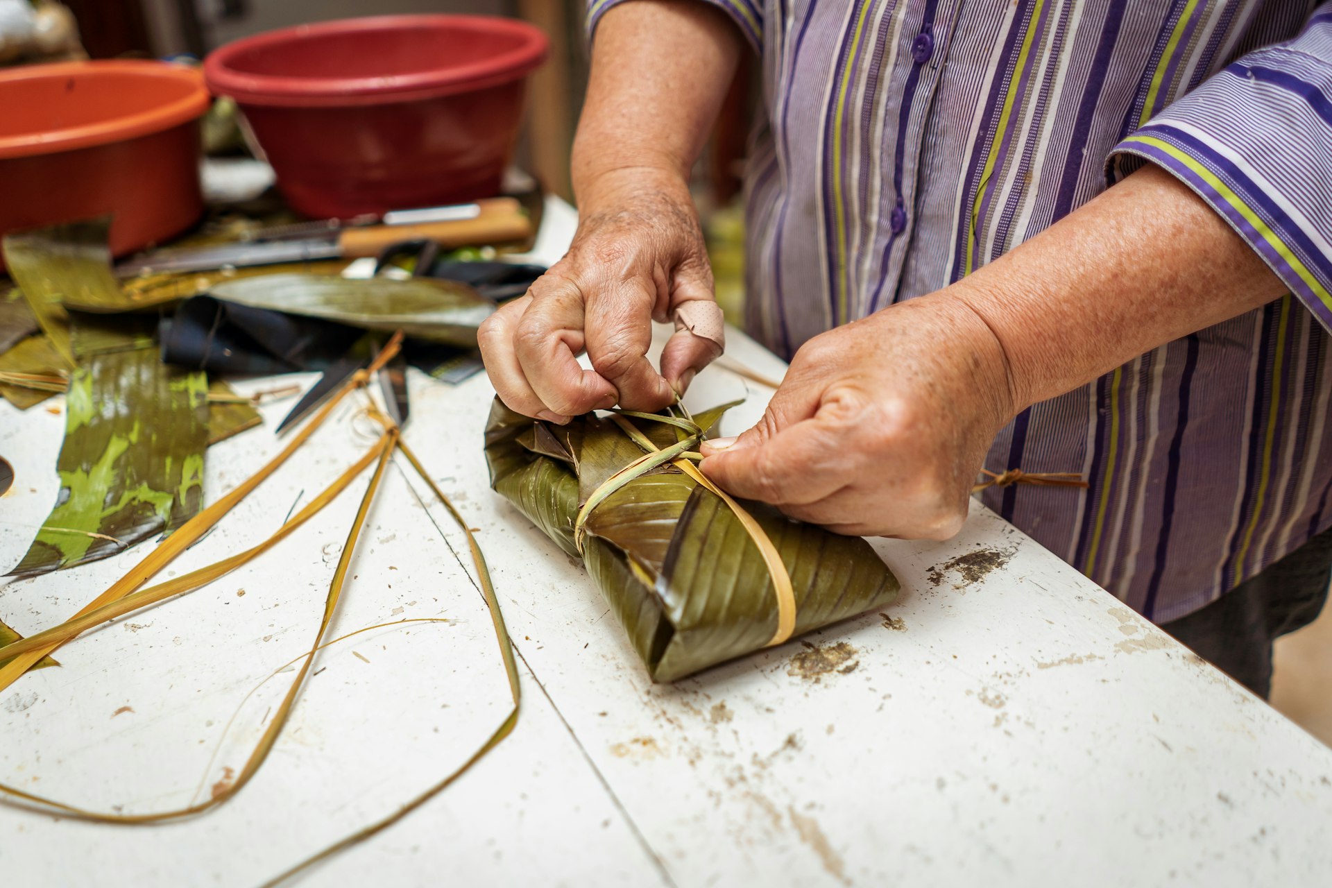 A shot of man hands as he works on handicrafts in Tegucigalpa, Honduras, Central America