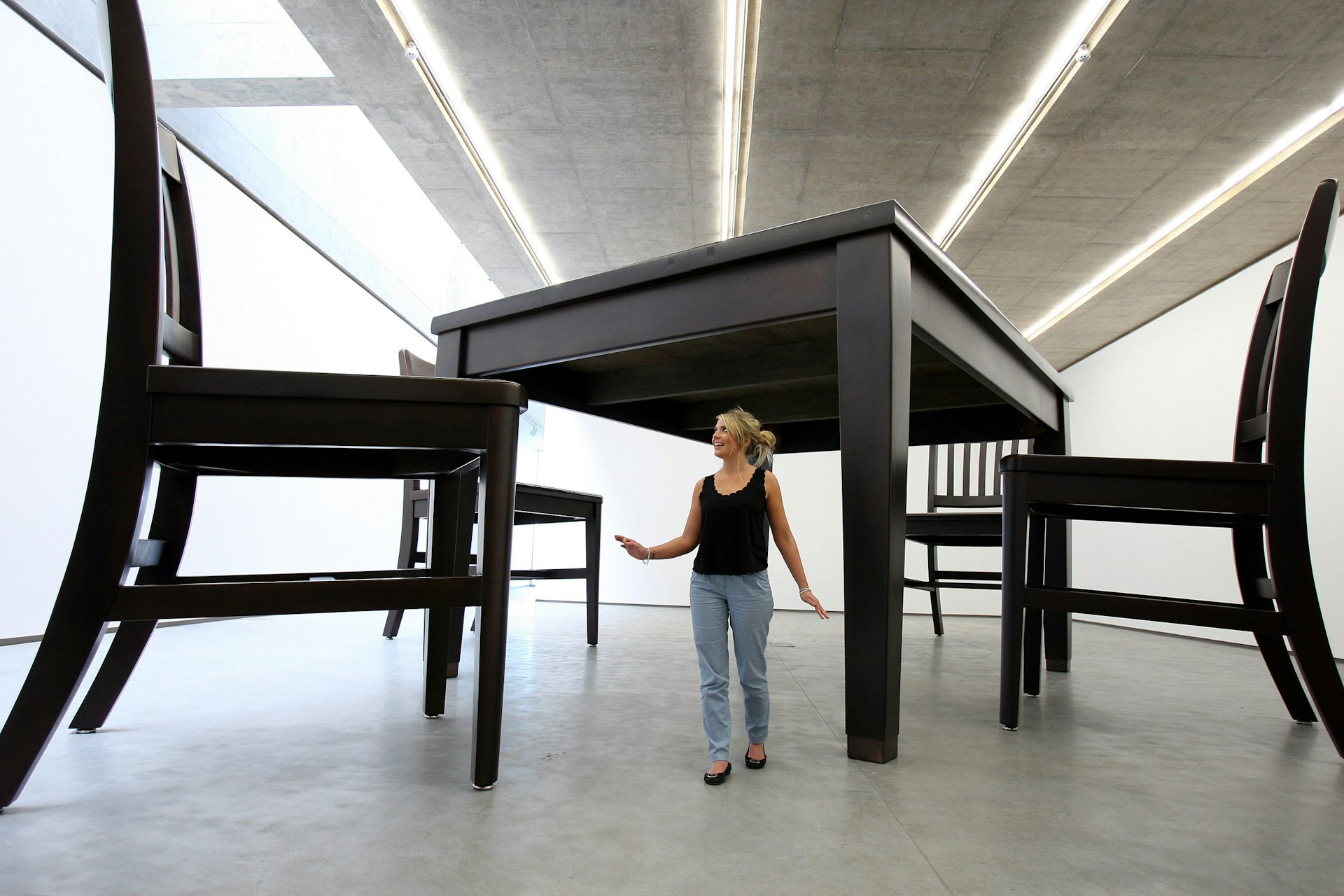 An exhibit titled Table and Four Chairs by Robert Therrien in the MAC museum in Belfast, Northern Ireland