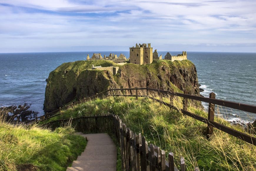 Dunnottar Castle - a ruined medieval fortress located upon a rocky headland on the coast of Scotland near Aberdeen. The castle was restored in the 20th century and is now open to the public