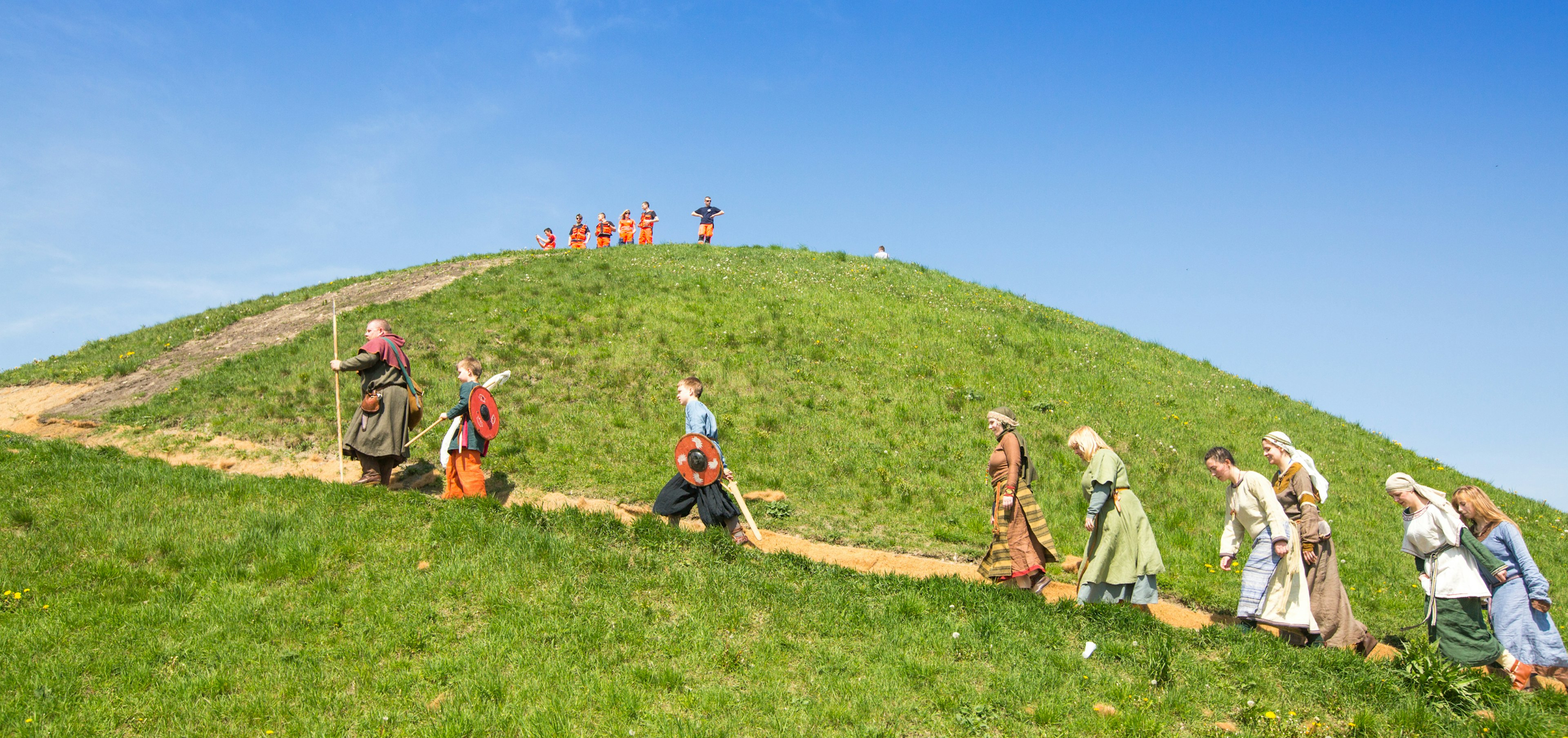 People in historical costumes participate in Rekawka, a Polish tradition on the Tuesday after Easter, Kraków, Malopolskie, Poland