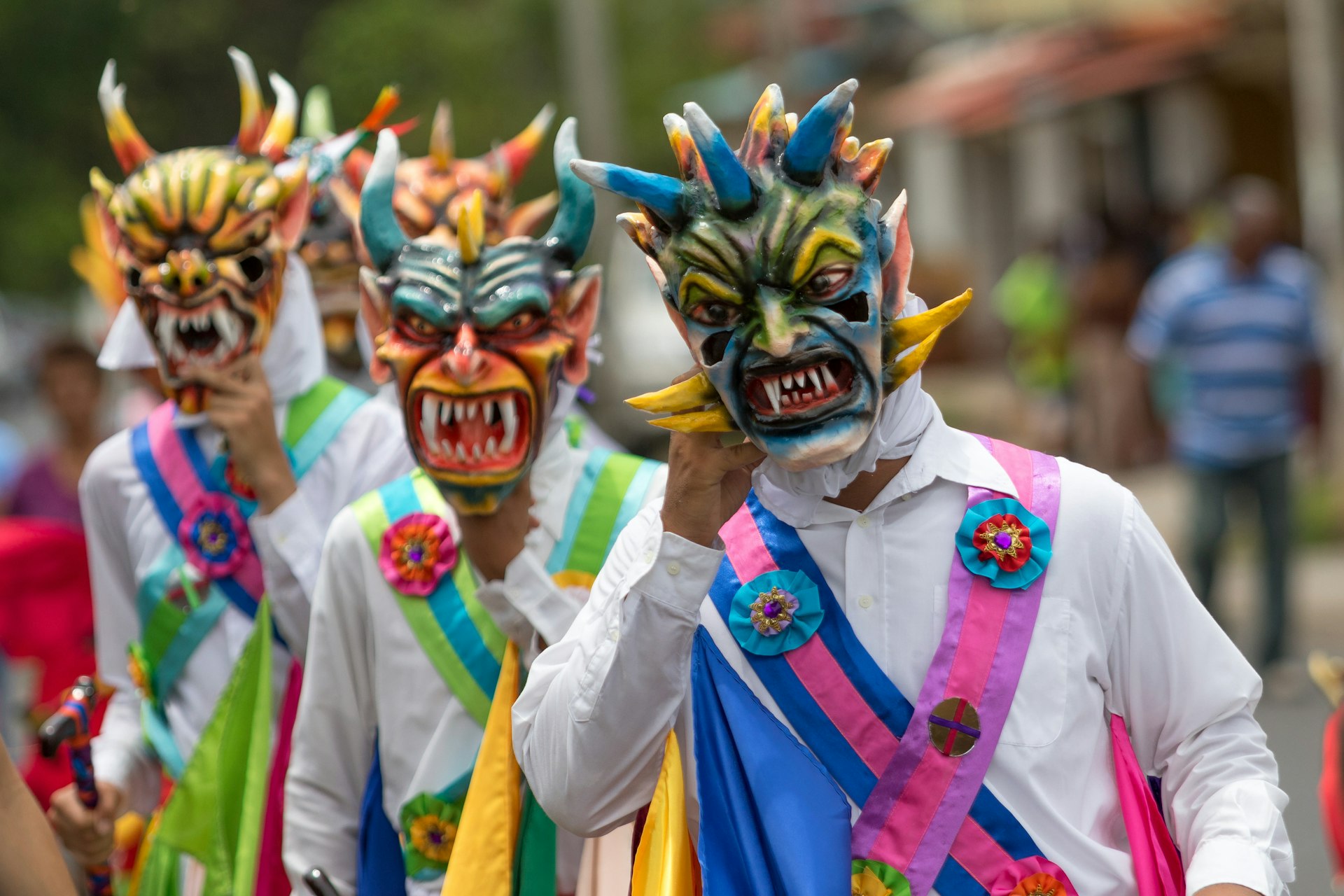 La Villa de los Santos, Panama: men wearing colourful traditional mask and clothing during Corpus Cristi celebration