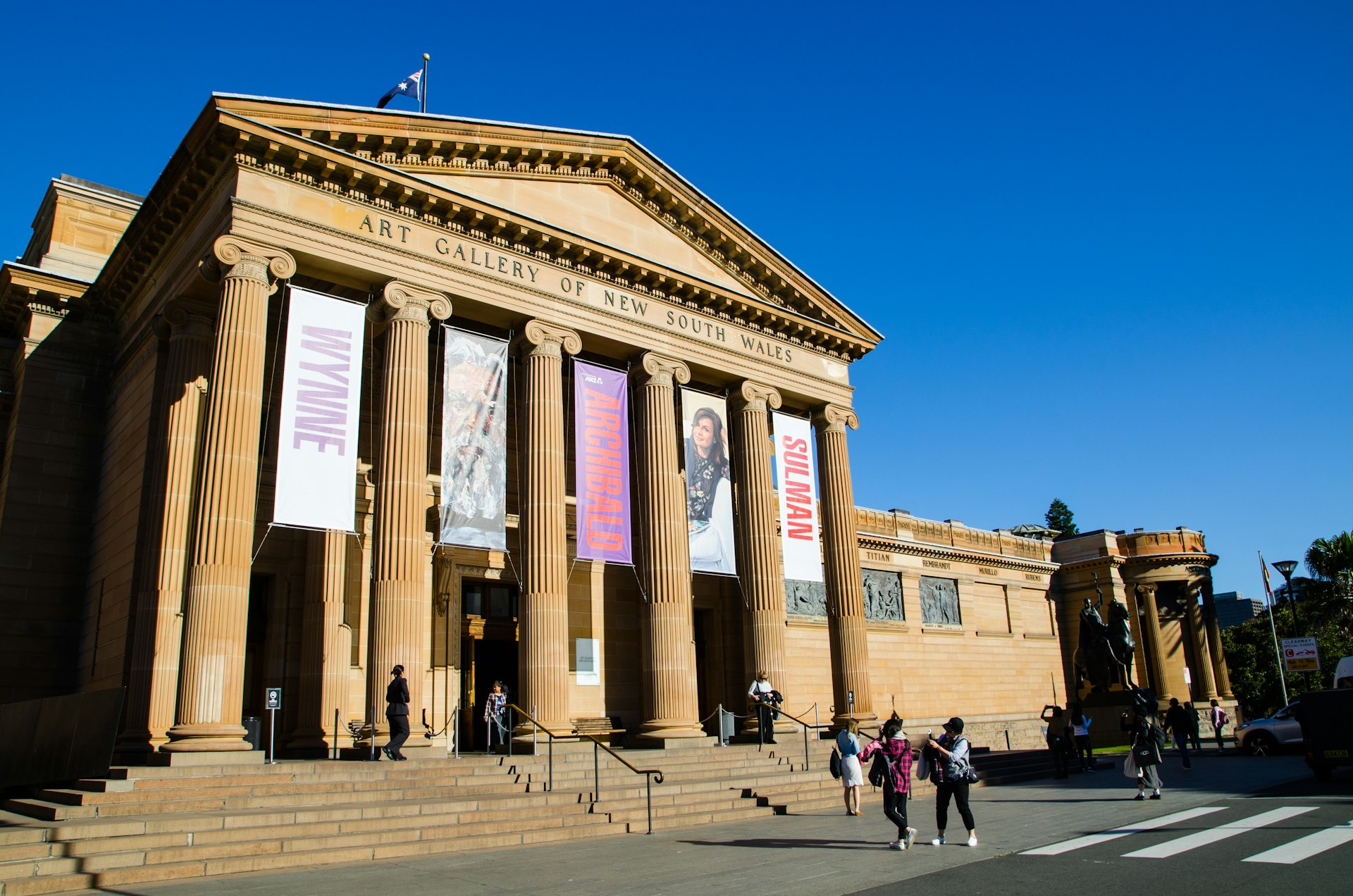 Visitors by the entrance to the Art Gallery of New South Wales