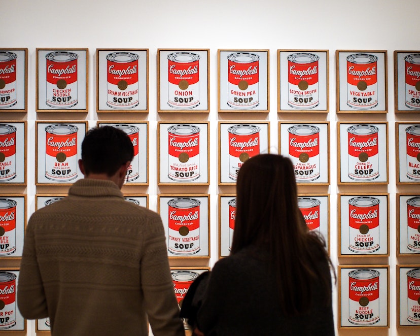 Museum of Modern Art, or MoMA, Manhattan, New York, United States of America - Campbell's Soup Cans, the artwork by Andy Warhol. Leading figure in pop art. Famous work. Visitors watching.