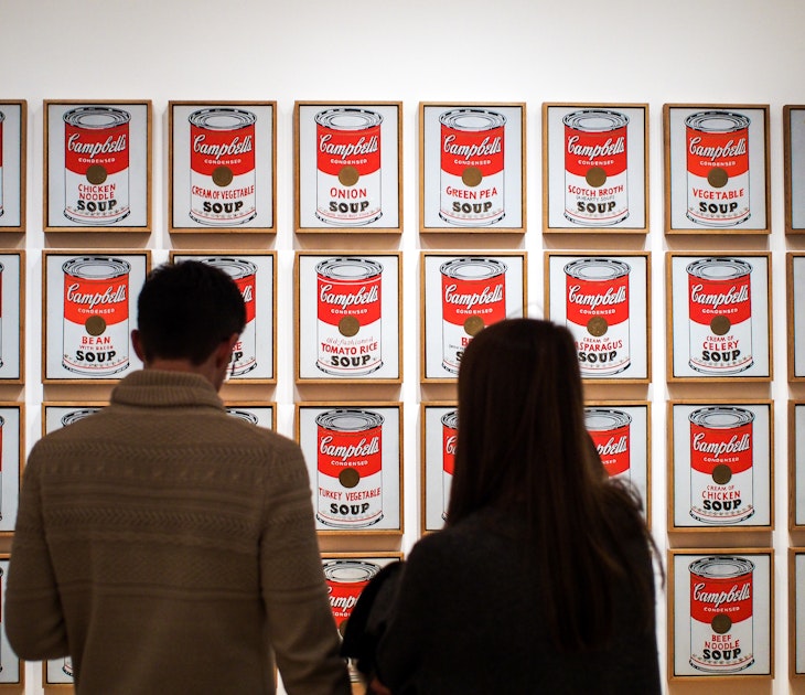 Museum of Modern Art, or MoMA, Manhattan, New York, United States of America - Campbell's Soup Cans, the artwork by Andy Warhol. Leading figure in pop art. Famous work. Visitors watching.