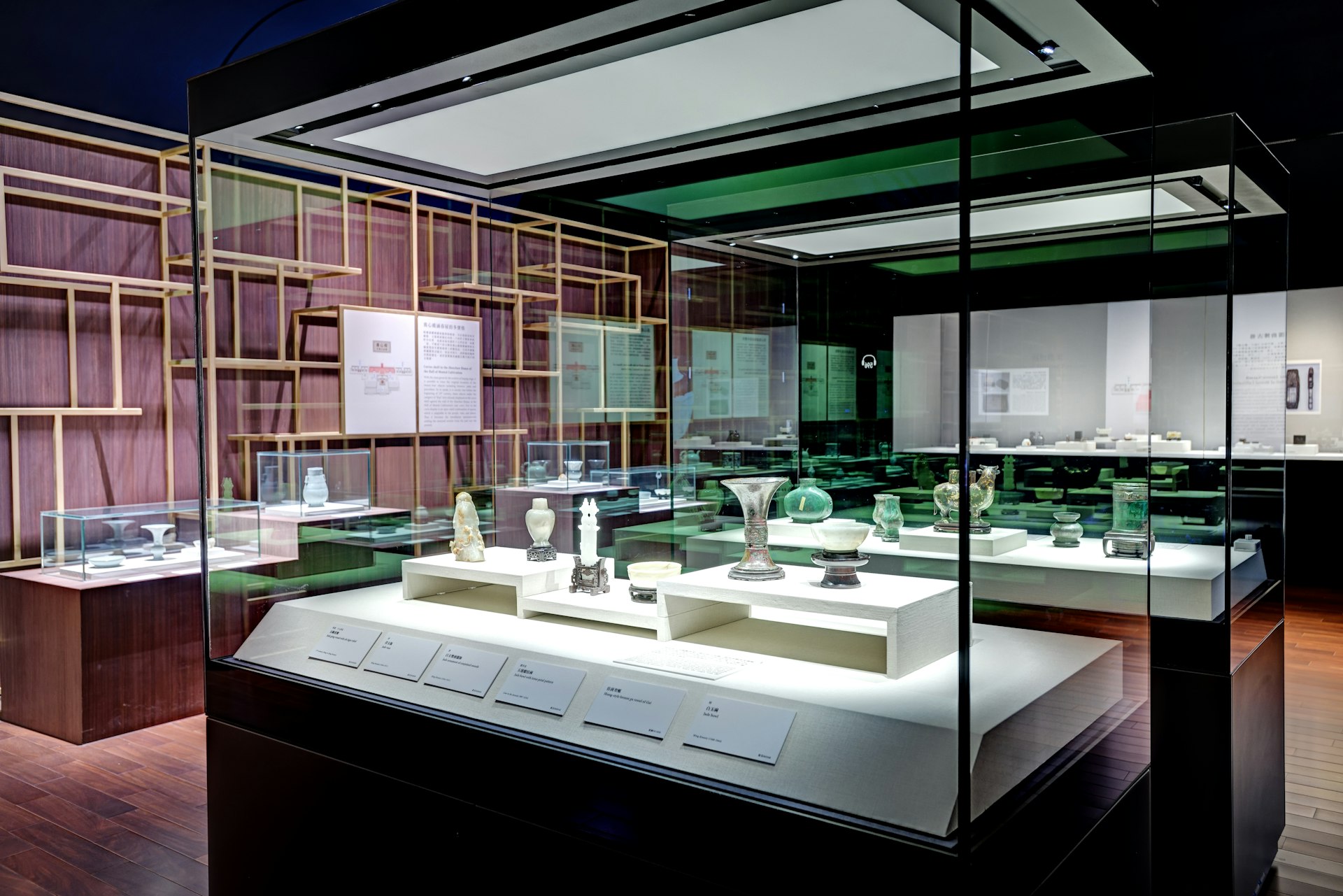 Exhibition displays with jade objects and other treasures at the southern branch of the National Palace Museum, Chiayi, Taiwan