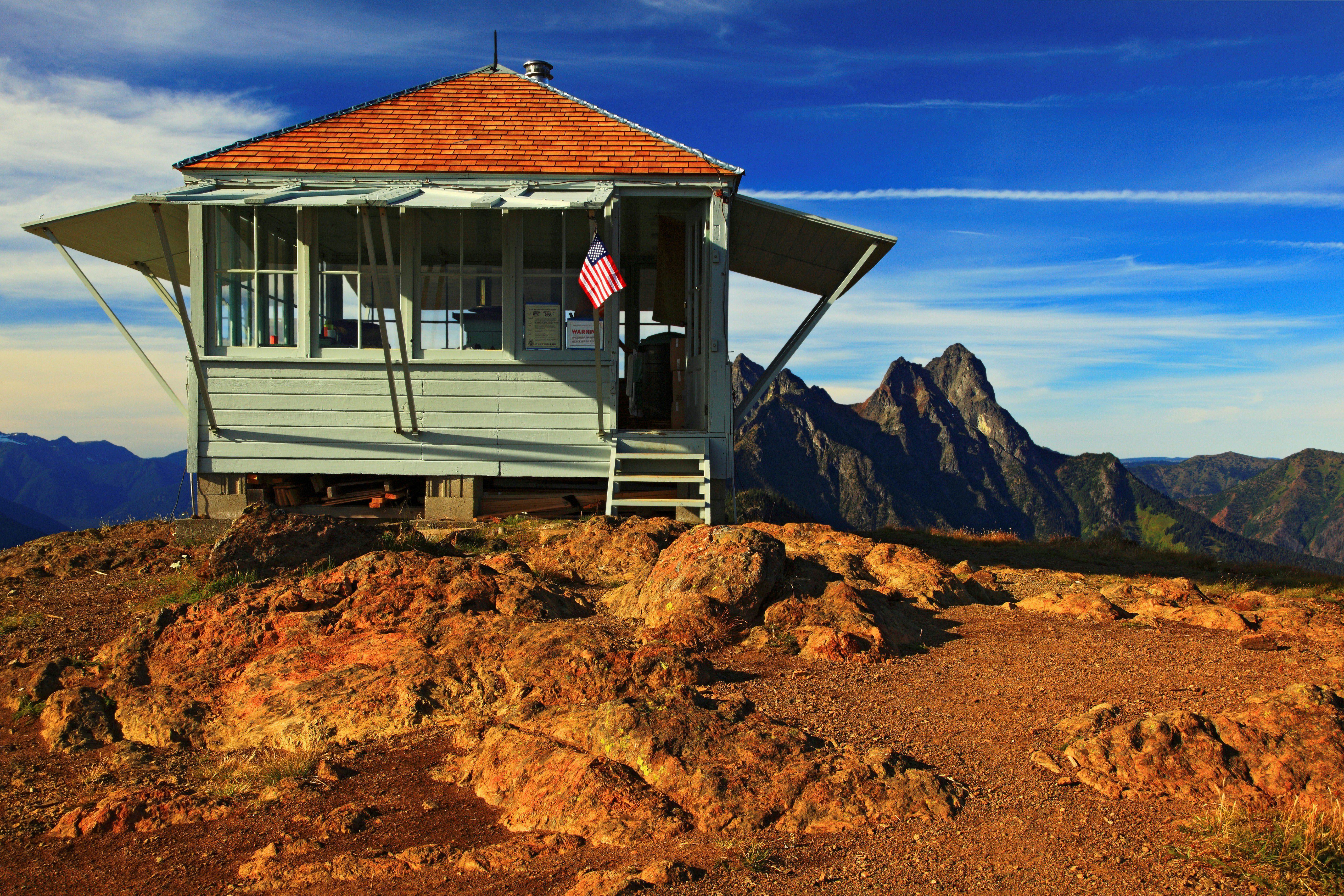 A lookout cabin on a mountain peak in Ross Lake Recreation Area, Washington
