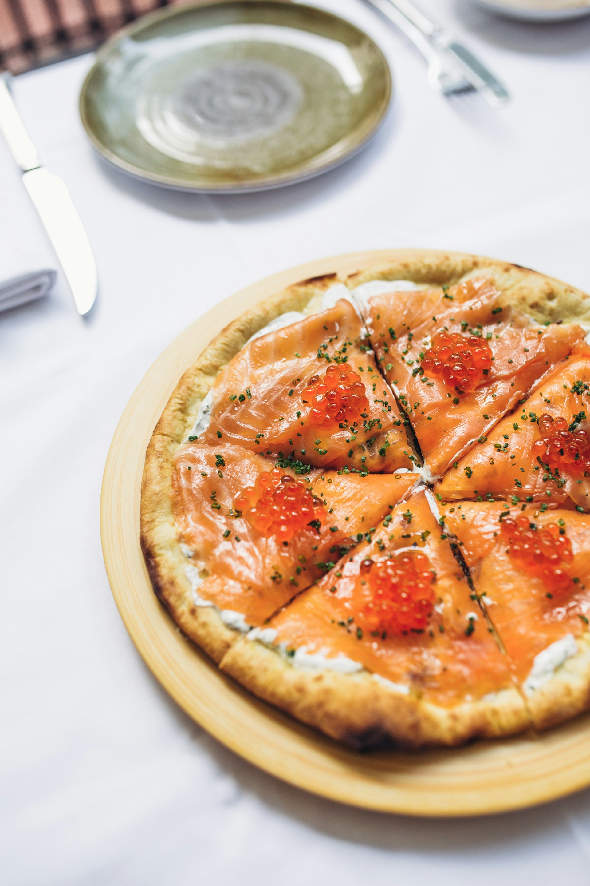 Spago in Los Angeles' smoked salmon pizza with salmon roe 
