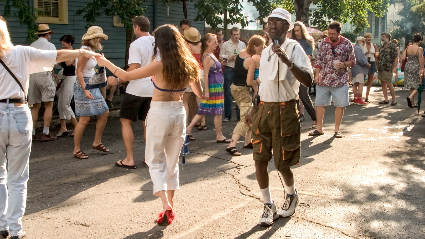 Dogman Smith performs blues r b and rock at the annual street party at Vaughns Bar in the Bywater.
